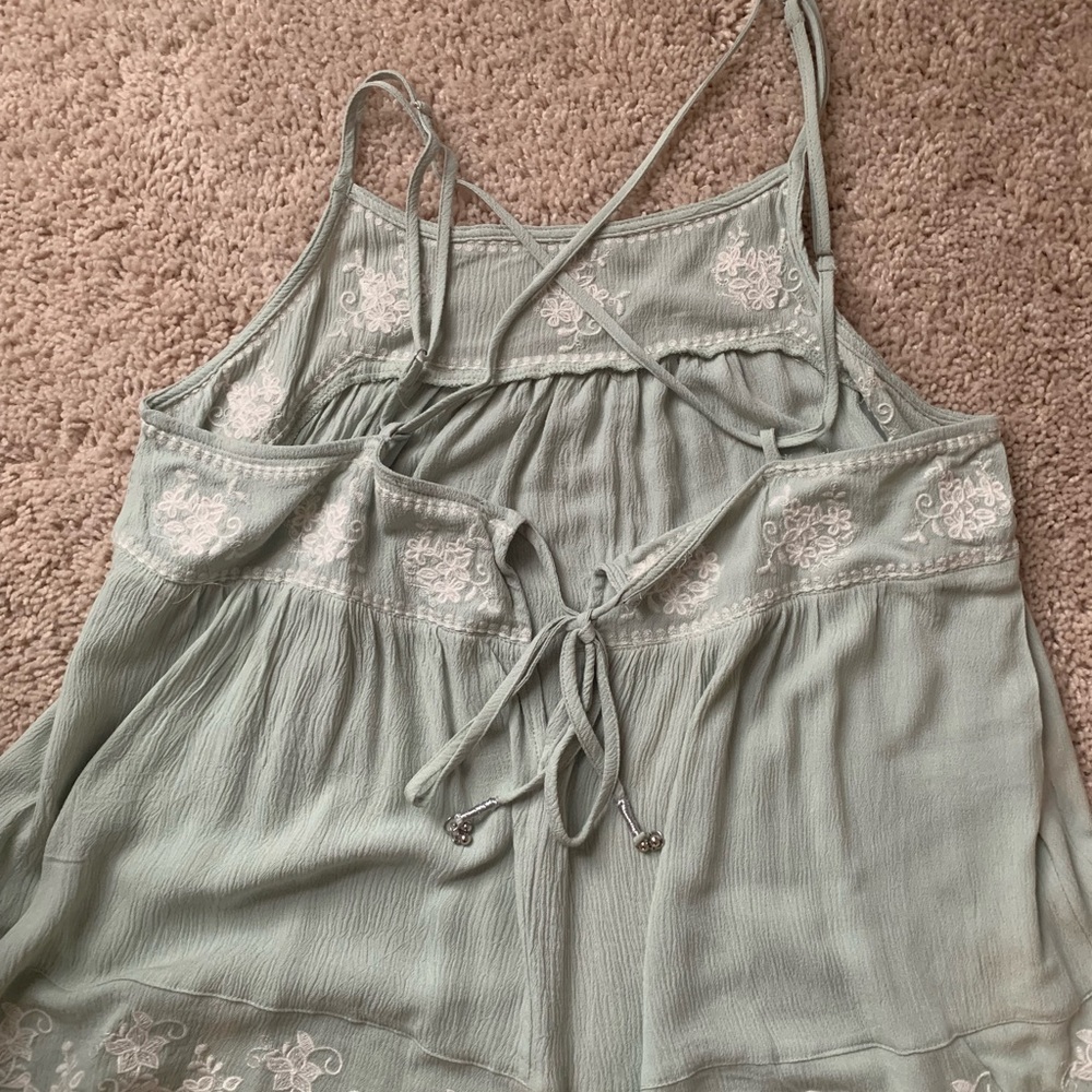 In-Loom size Medium mint green tank top. Never worn in perfect condition.